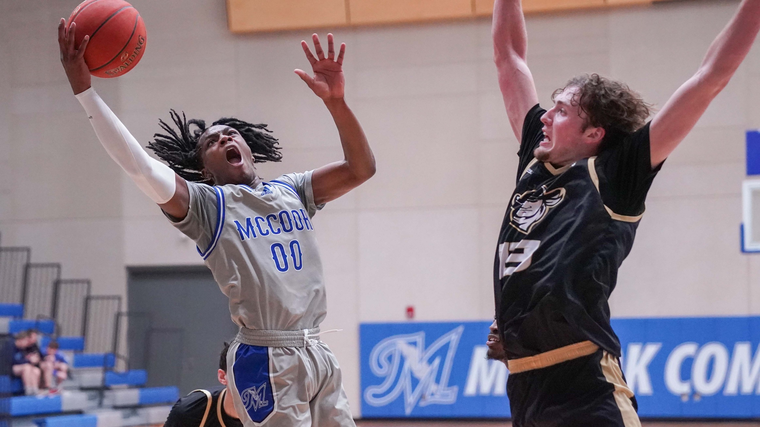 Cougars take over second-place with 73-67 win over MCC men